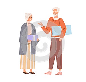 Senior love couple exchanging holiday gifts. Aged man and woman standing with presents. Grandma and granddad presenting photo