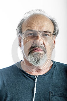 Adult man wearing an O2 cannula for emphysema photo