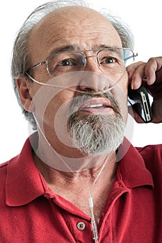 Senior male with breathing disability talking on the phone