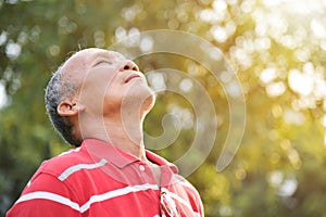 Senior male breathing fresh air.