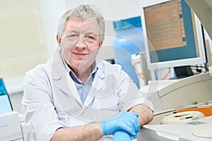Senior male doctor portrait at clinic laboratory