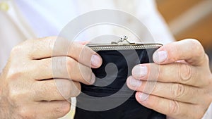 Senior male holding wallet, social security, payments for pensioners, protection