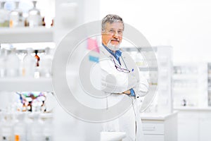 Senior male researcher carrying out scientific research in a lab