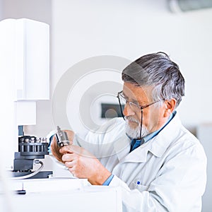 Senior male researcher in a lab