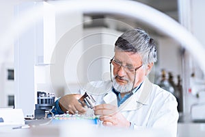 Senior male researcher in a lab