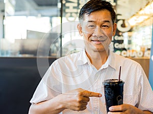 Senior males feel happy drinking coffee in the morning, lifestyle senior concept