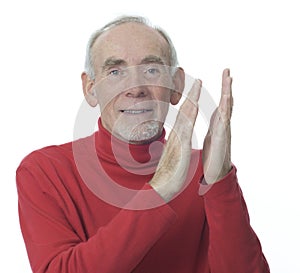 Senior man applauding