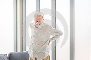 Senior man with back pain, Mature man suffering from low back pain, Old man with back pain