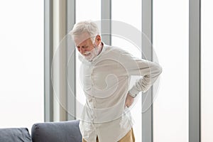 Senior man with back pain, Mature man suffering from low back pain, Old man with back pain