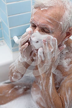Senior man bathing