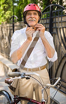 Senior man with bicycle