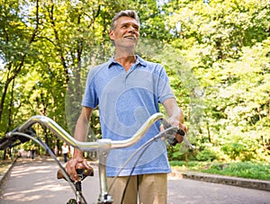 Senior man with bicycle