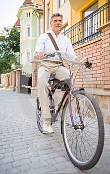 Senior man with bicycle