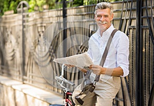 Senior man with bicycle