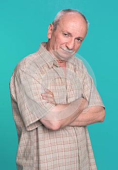 Senior man on a blue background