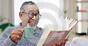 Senior man, book and coffee on sofa with smile, reading or relax in retirement in home living room. Elderly person