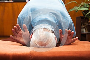 Senior man bowing