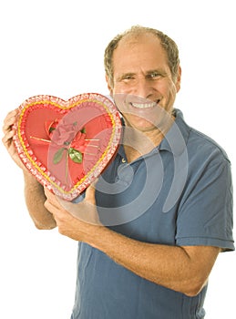 Senior man box of Valentine day chocolate candy