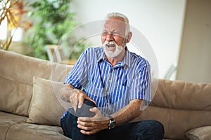 Senior man with chronic knee problems