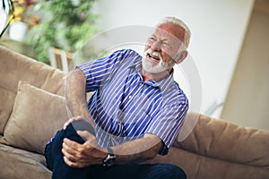 Senior man with chronic knee problems and pain