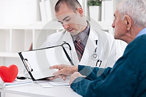 Senior man consulting with doctor