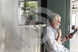 Senior Man with Digital Tablet