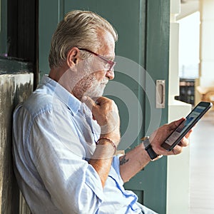 Senior Man Digital Tablet Connection Technology Concept