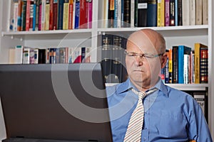 Senior man disgusted with computer