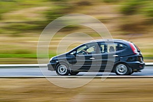 Senior Man Driving with Car at Outdoor