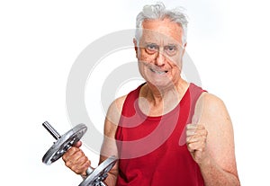 Senior man with dumbbell.