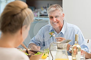 Senior man eating food