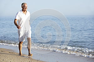 Senior Man Enjoying Beach Holiday