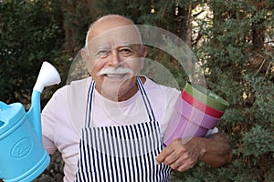 Senior man enjoying gardening outdoors