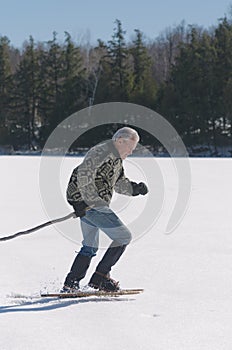 Senior Man Exercising on Lake