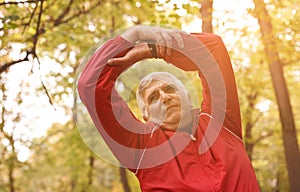 Senior man exercising in the park.