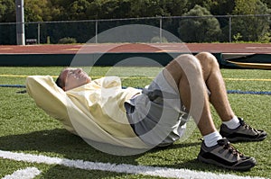 senior man exercising sit ups ab exercise