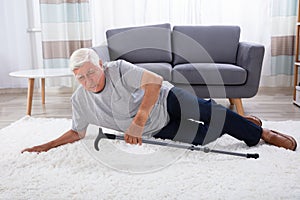 Senior Man Fallen On Carpet