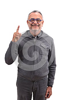Senior man with finger in the shape of number