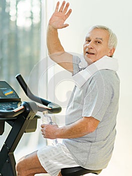 Senior man in a fitness club
