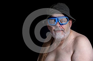 Senior man getting ready to have a bath photo