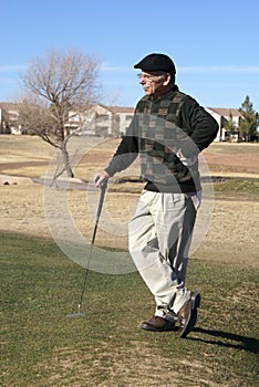 Senior Man Golfing