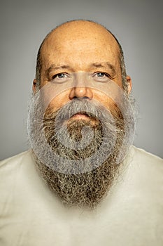 Senior man with a gray long beard