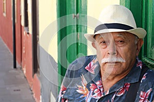 Senior man with grumpy expression