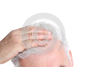 Senior man with hair loss problem isolated on white