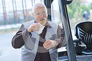 Senior man having break lunch