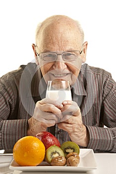 Senior man having a healthy breakfast