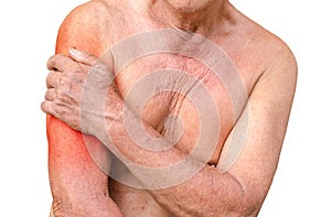 Senior man having shoulder pain,monochrome photo with red as a s