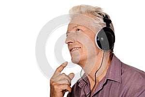 Senior man in headphones