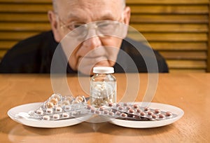 Senior man and his pills