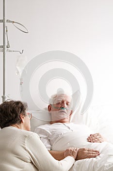 Senior man and his wife in hospital